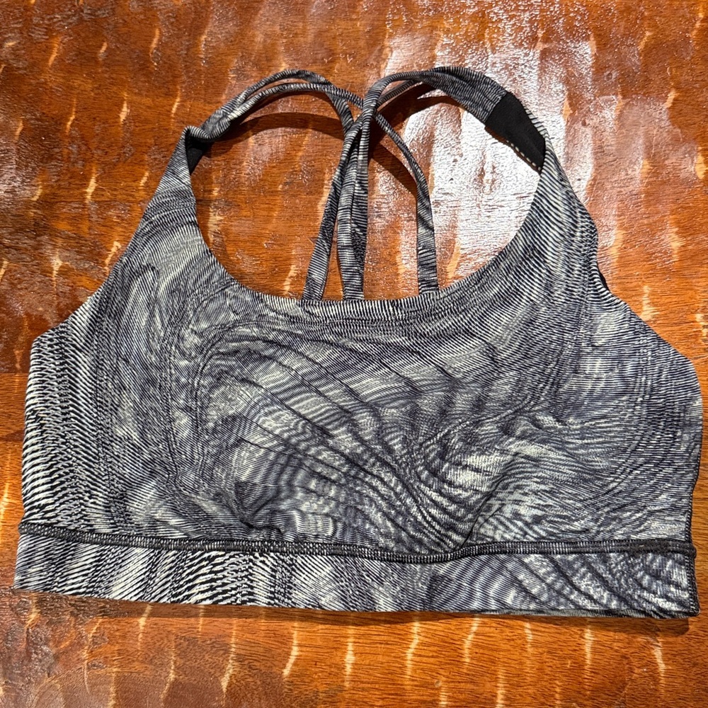Lululemon Black/Grey strap Sports bra. Sz 10. Very gently used. No bra inserts.